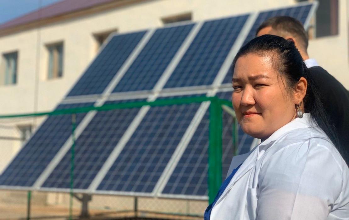 A health worker at a clinic powered by solar panels installed with UNDP support.