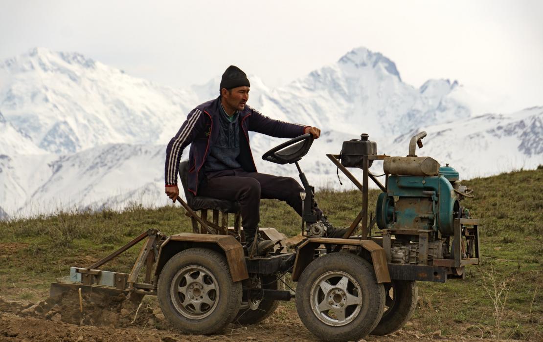 Man with tractor in Tajikistan
