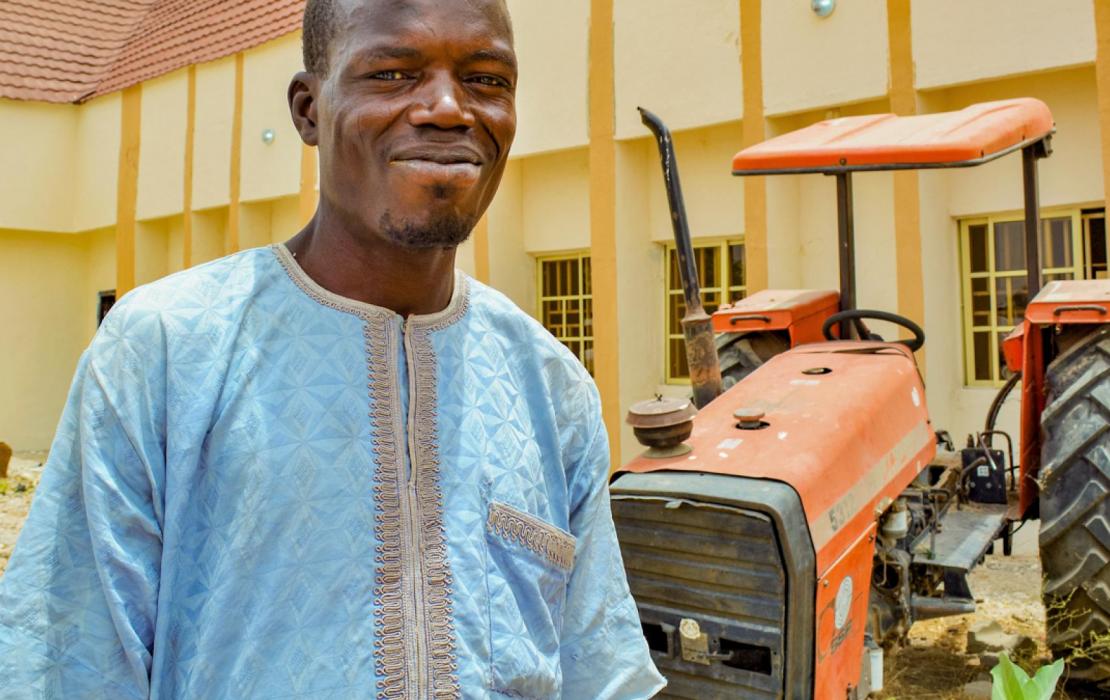 A smiling worker in Nigeria