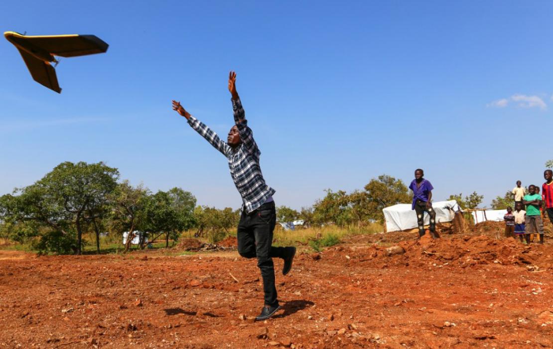Man launches drone in Uganda
