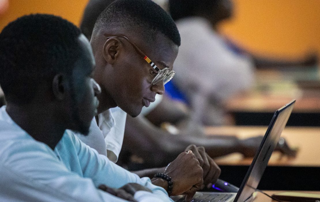 Senegal is home to a growing number of startups, some of which are focusing on renewable energy solutions. Photo: UNDP Senegal Young Senegalese entrepreneurs working collaboratively on laptops during a startup training or tech workshop