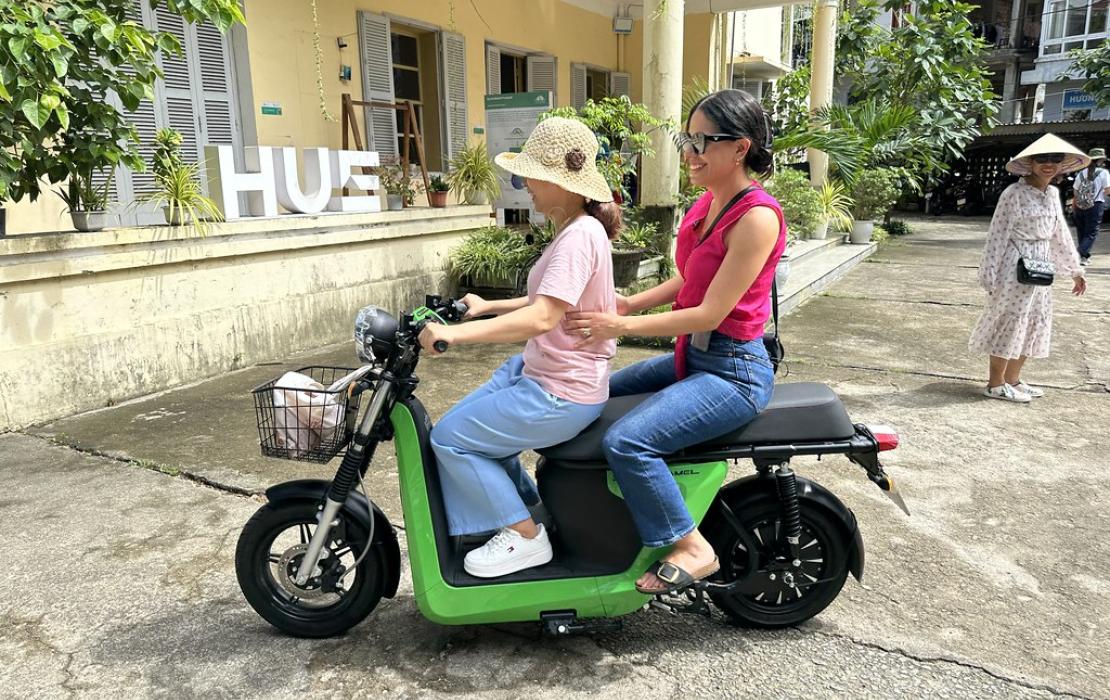 Group riding environmentally-friendly bikes in the city