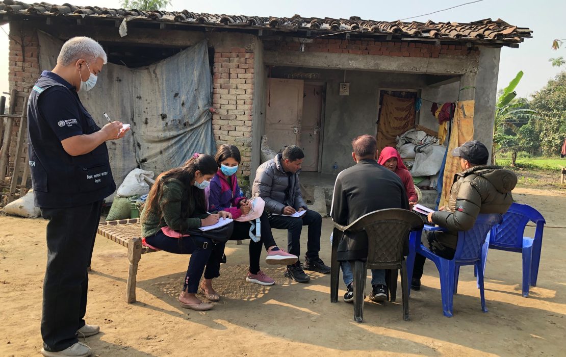 Nepal has conducted a vulnerability and adaptation assessment for the health sector, updated its Health National Adaptation Plan and integrated health targets into its Nationally Determined Contribution. Photo: WHO Nepal Health workers and community members gather outside a rural home in Nepal to discuss the impacts of climate change—highlighting local engagement as a key strategy in building climate-resilient health systems.