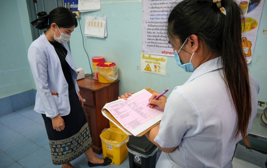Healthcare workers in Lao PDR review climate-health safety procedures, part of national efforts to improve waste management and build resilient health systems in the face of climate change. Photo: WHO Lao PDR Healthcare workers in Lao PDR review climate-health safety procedures, part of national efforts to improve waste management and build resilient health systems in the face of climate change