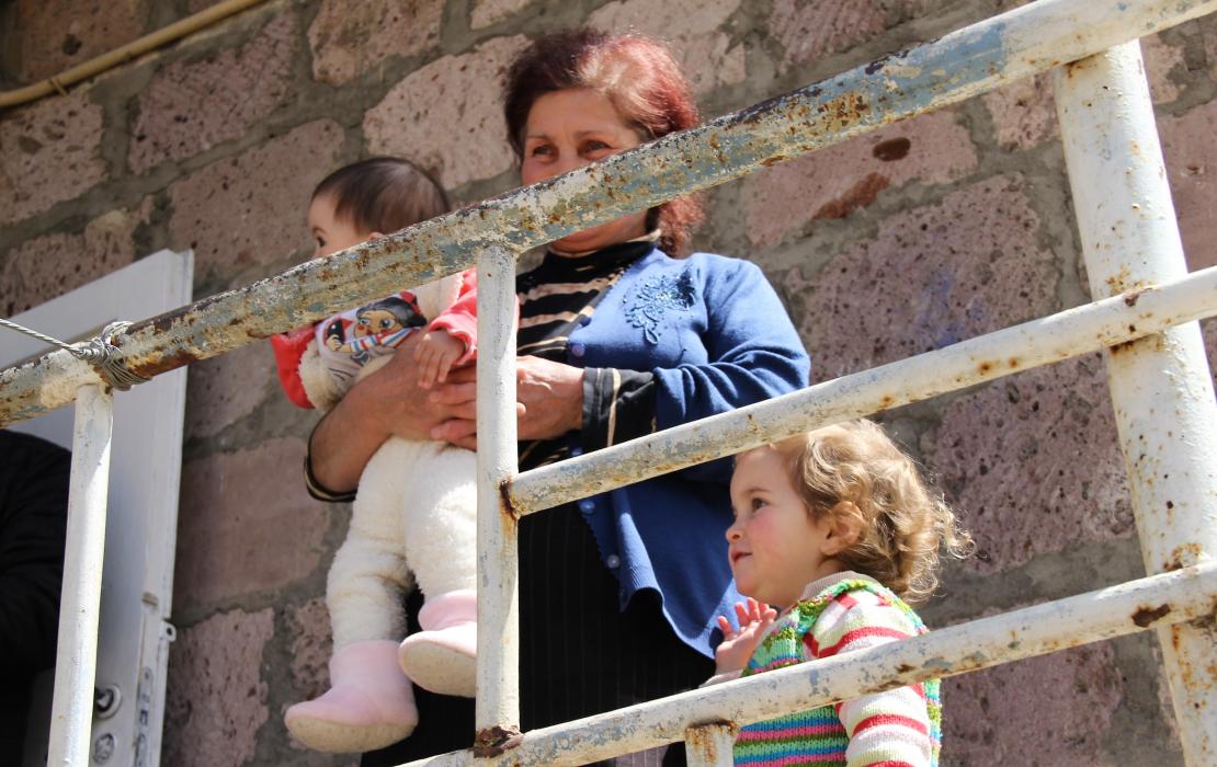 Woman with her children in the village of Chambarak