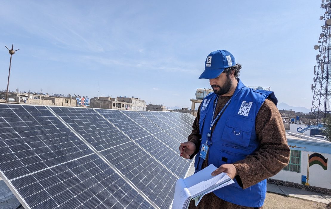 A technician installing solar panels in Afghanistan, supporting the country's recovery efforts. Photo: UNDP Afghanistan A technician installing solar panels in Afghanistan, supporting the country's recovery efforts.