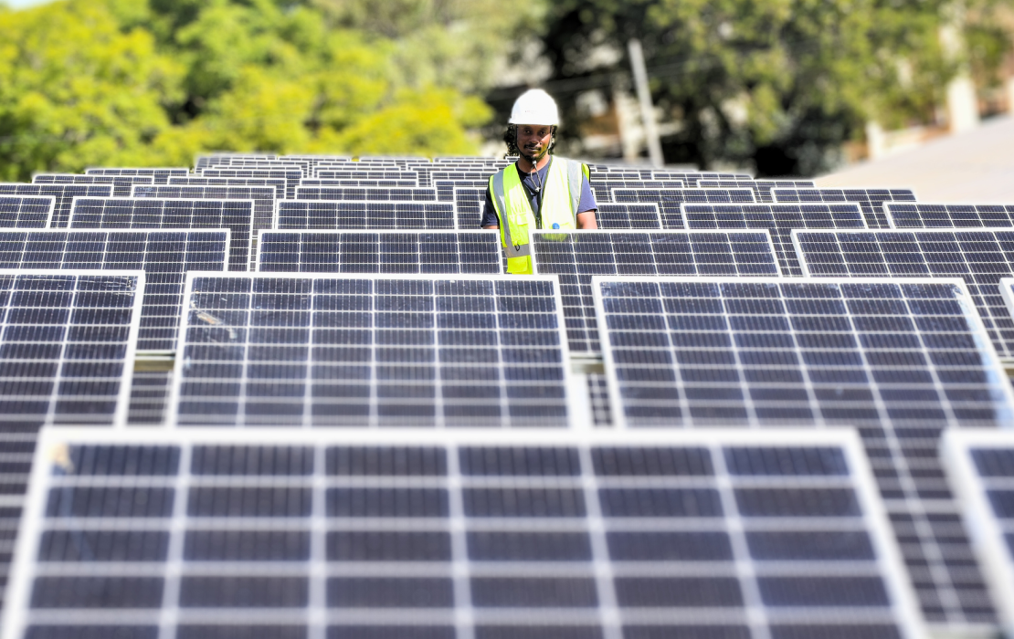 Inspecting solar panels, Lilongwe, Malawi