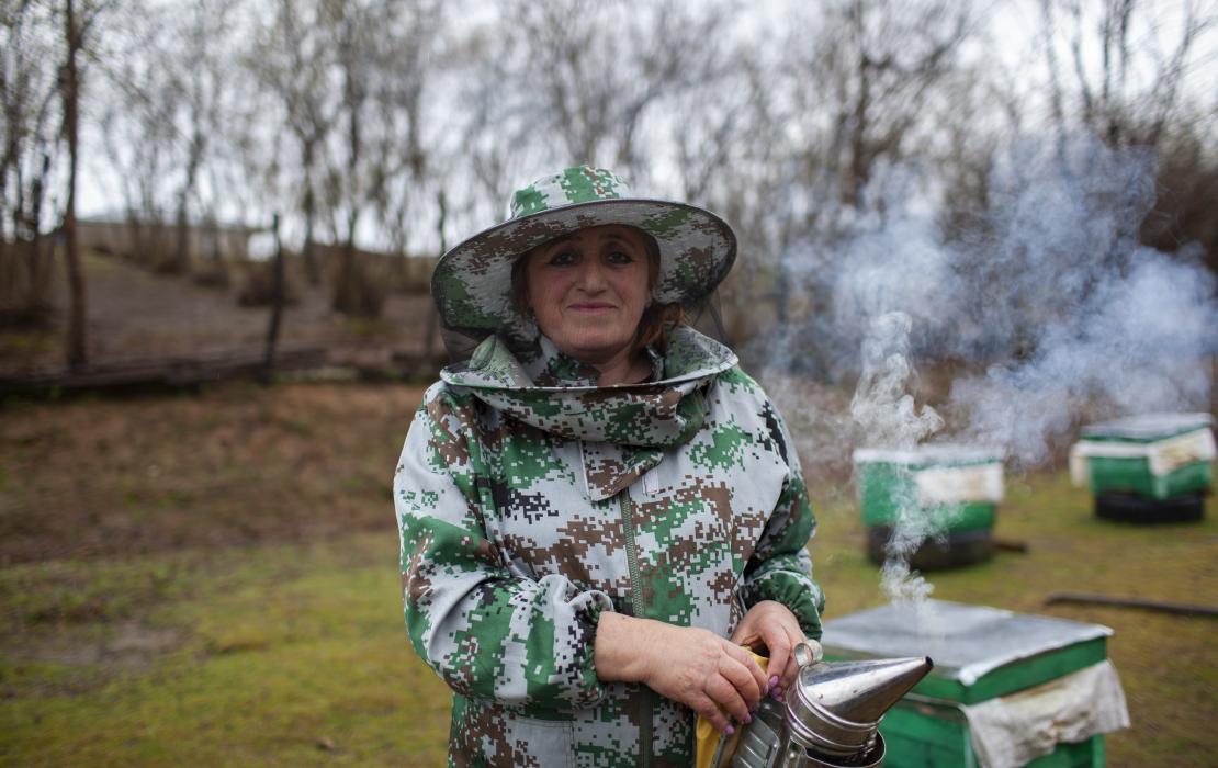 Woman beekeeper in Georgia