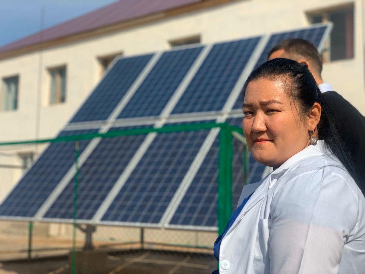 A health worker at a clinic powered by solar panels installed with UNDP support.