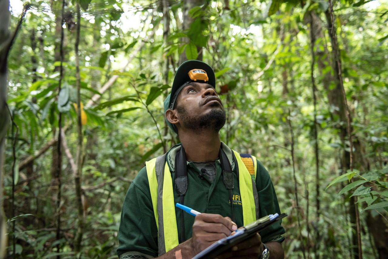 Samuel Jepi, National Forest Initiative, outside the NFI camp near Kupiano, Papua New Guinea. Carbon Trading