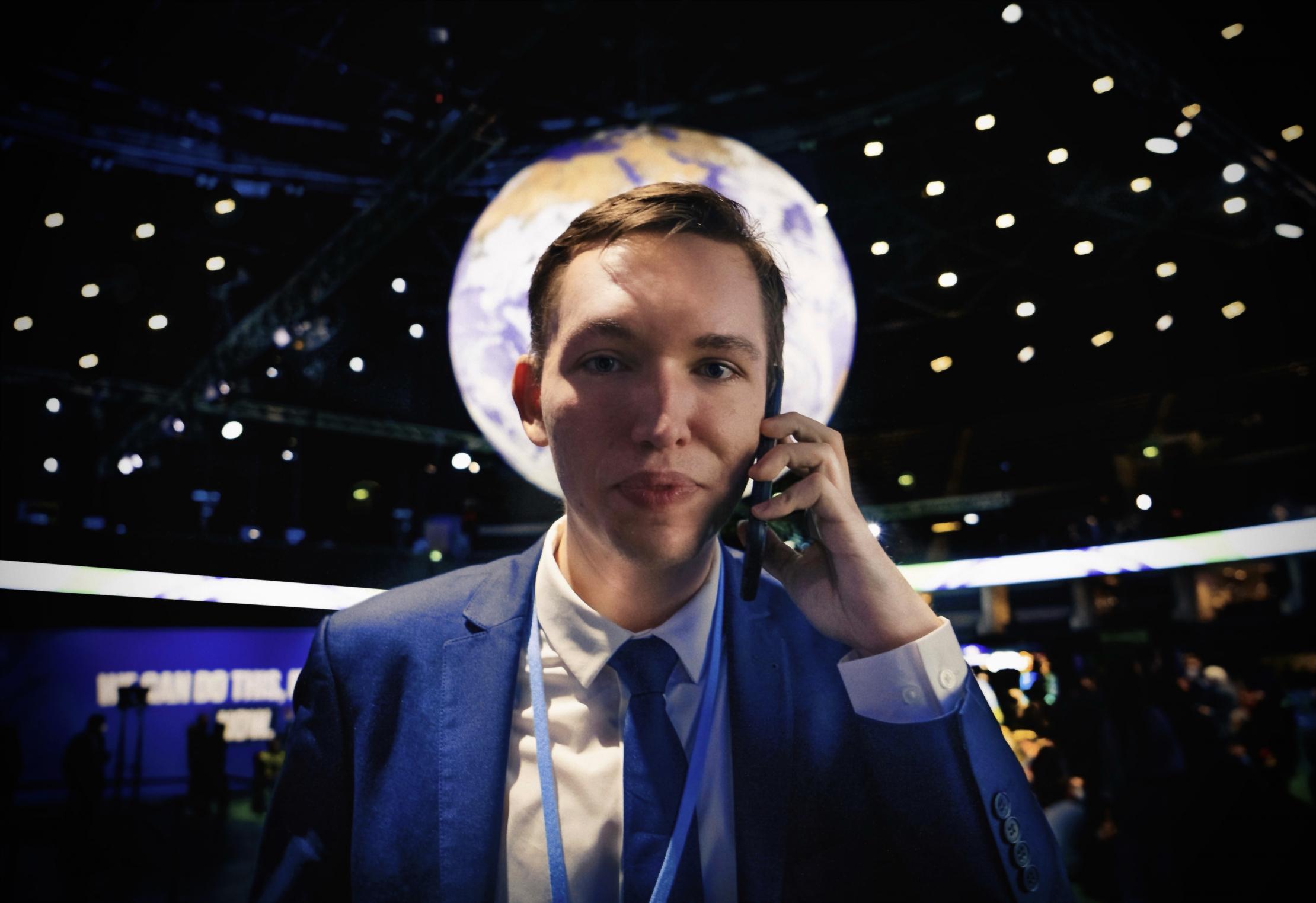 Giving a phone interview to the CNN during COP26 in Glasgow, November 2021. Photo: Beatrice Bucht.