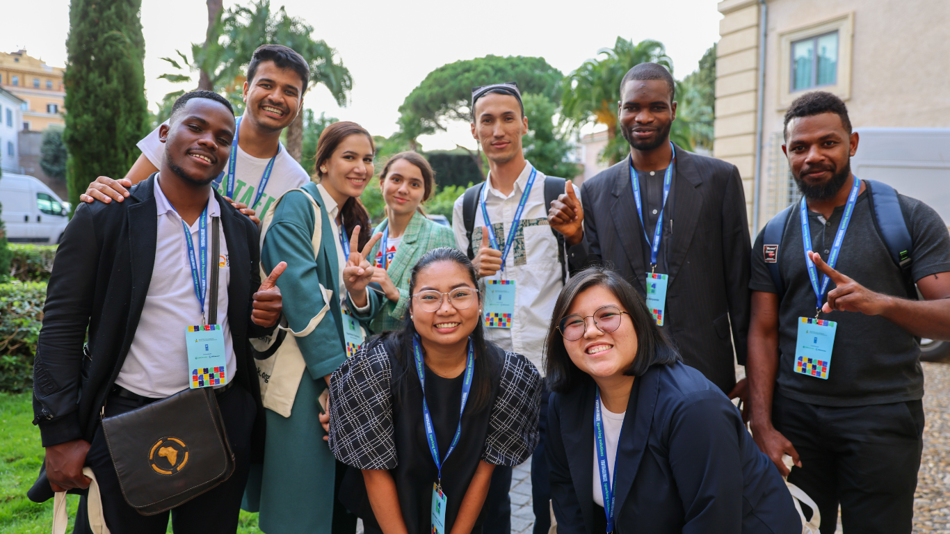 Young people smiling at the camera