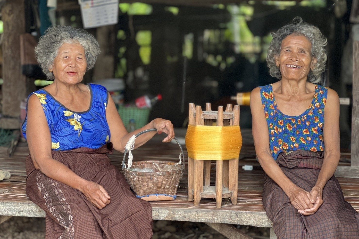 Photo: Foundation for Community Soul Sisters Poey and Pen Boonmak show their climate smart farmer model for mulberry silk cultivation in Surin province, Thailand.