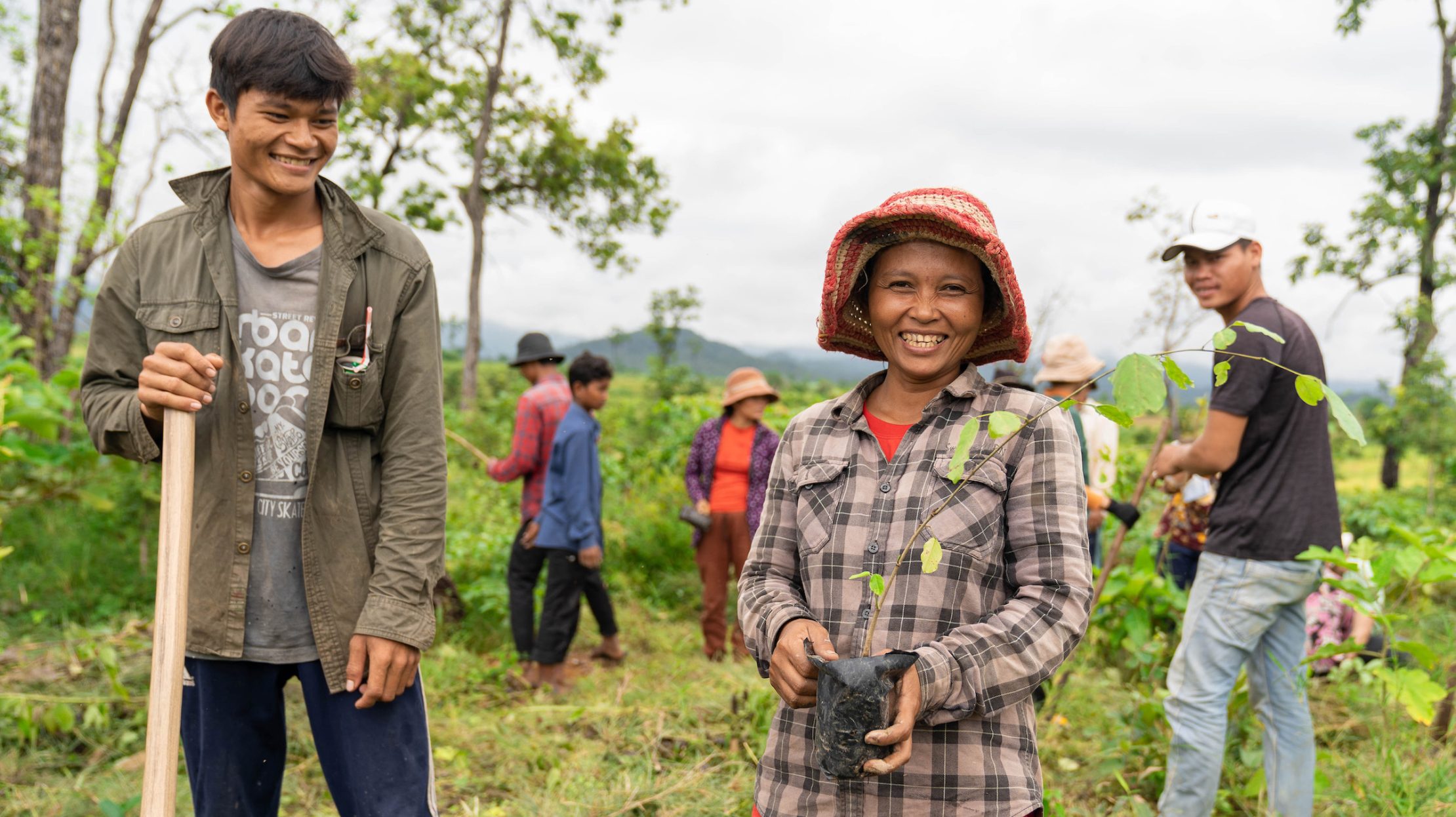 Photo: Manuth Buth / UNDP Cambodia Cambodian woman planting trees