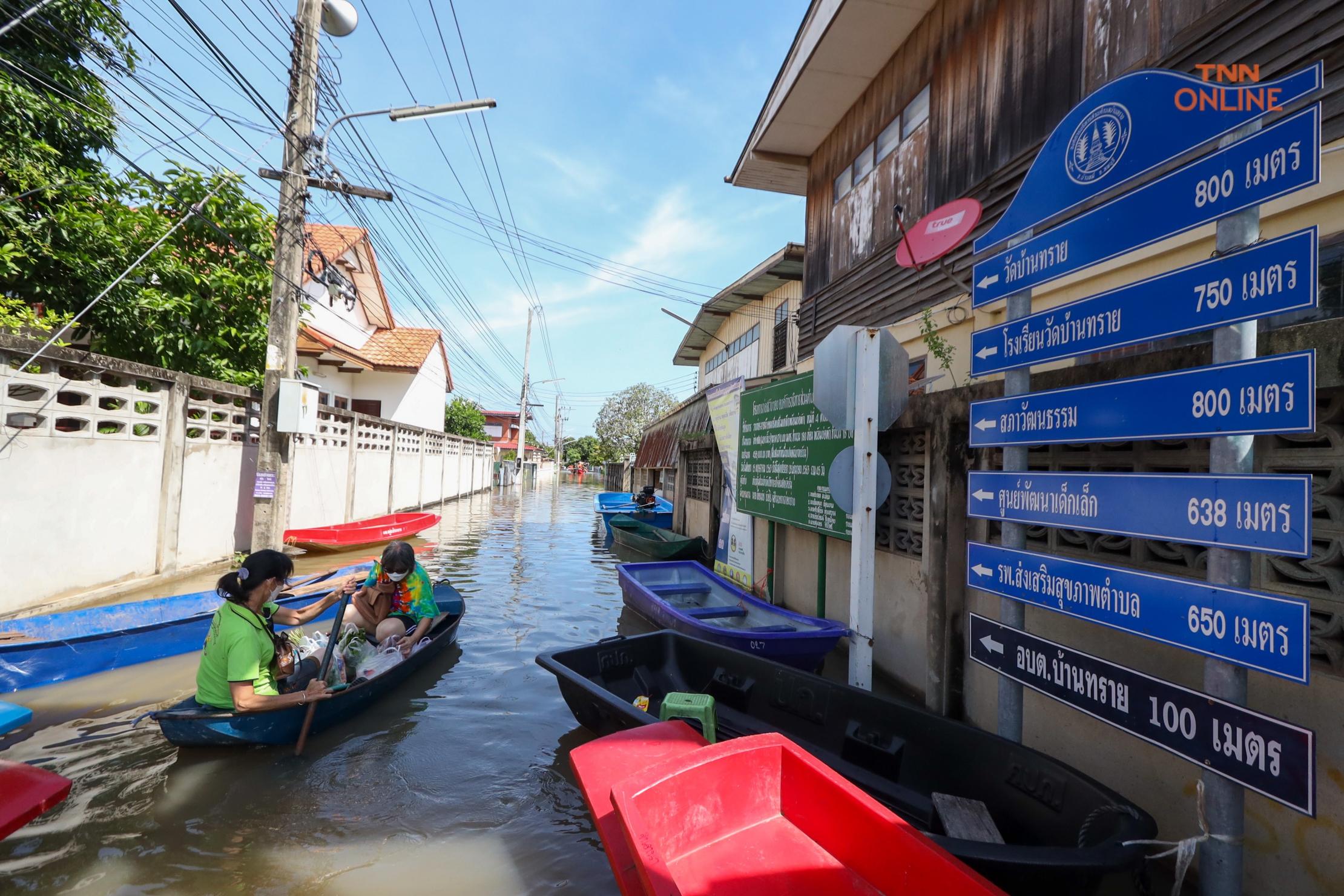 Residents of the flooded areas using boats for tranportation