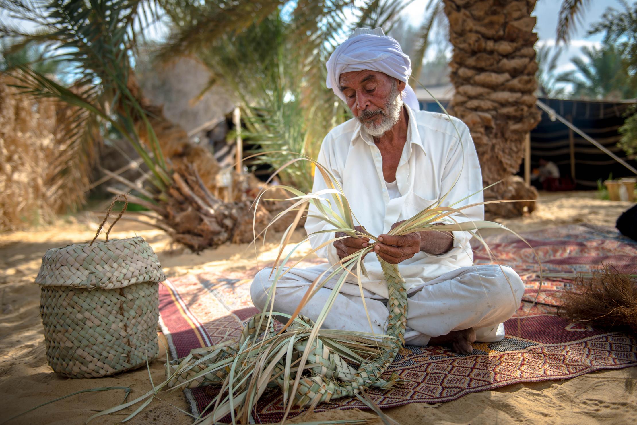 Man weaving baskets
