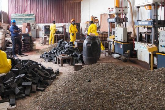 NELPLAST, a 'Waste' Recovery Platform member organization, reclycling plastic waste into pavement blocks. Photo: UNDP Ghana NELPLAST, a 'Waste' Recovery Platform member organization, reclycling plastic waste into pavement blocks.