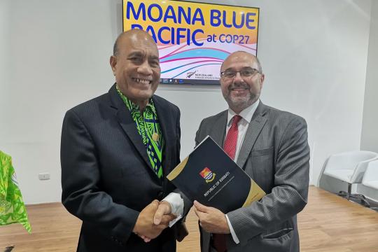 Photo by UNDP Pacific (Left) President of Kiribati, H.E. Taneti Maamau submitted the country's revised Nationally Determined Contribution at COP27.