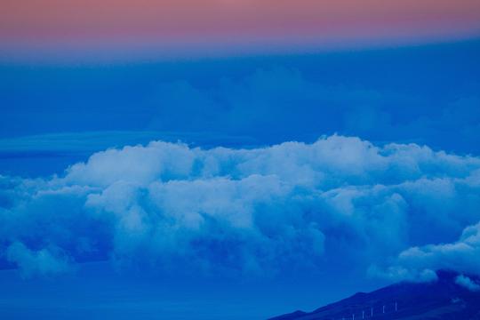 Clouds rolling against a sunset
