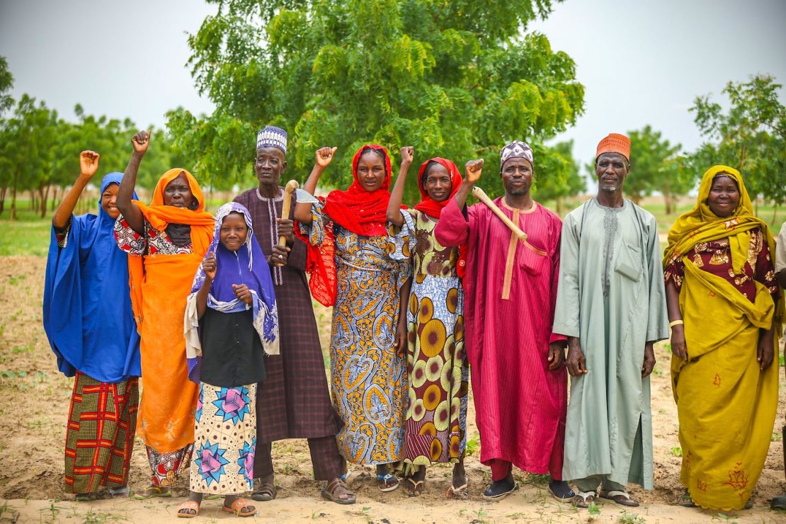Farmers from Borno State standing in their fields