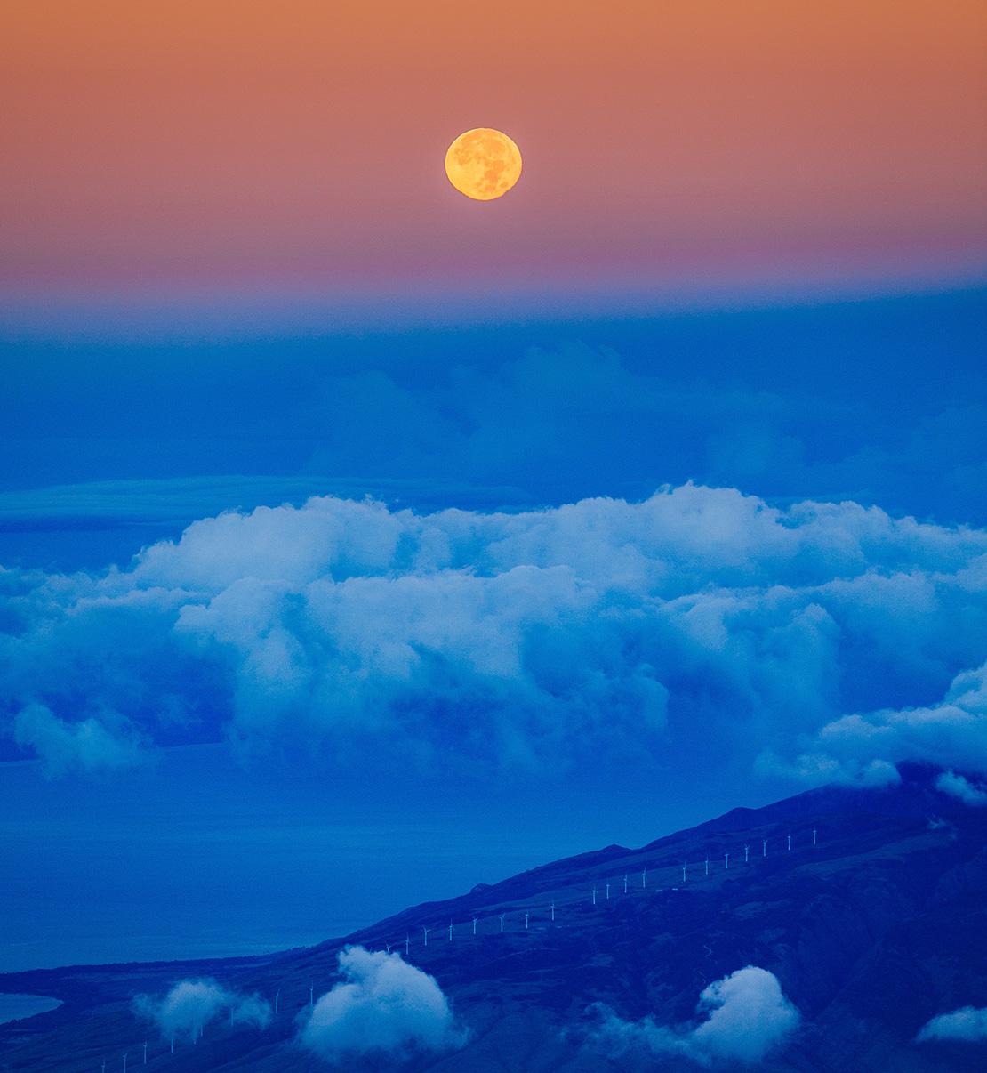 Clouds rolling against a sunset