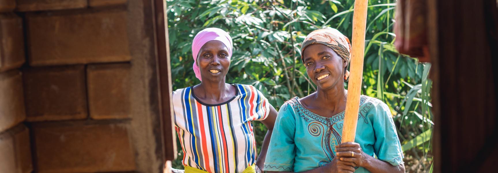 Women pounding millet in Burundi